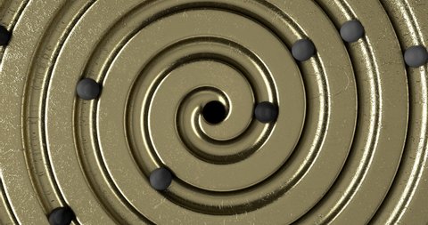 A spiral gold mechanism with small spheres rolling down it and falling through a hole