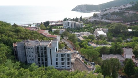 Canj Montenegro - seaside summer resort on the Adriatic coast, featuring long sandy beach and blue and turquoise crystal clear sea. Aerial footage.