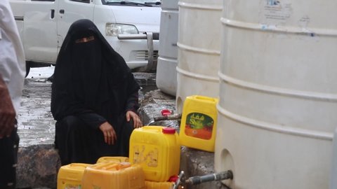 Taiz  Yemen - 17  June 2020 : A Yemeni woman sad because of the water crisis in the city of Taiz, Yemen