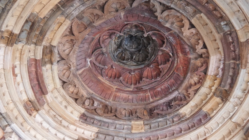 DELHI, INDIA - MARCH 12, 2019: a high frame rate clip of a ceiling decoration in the ruins of qutub minar complex