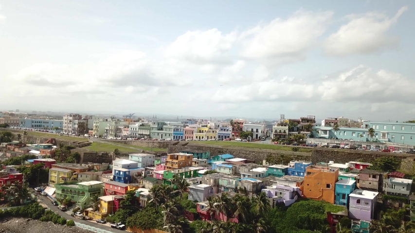 Vivid Cityscape of San Juan, Puerto Rico. Drone Aerial View of Colorful Houses in La Perla Neighborhood Under Beautiful Sky