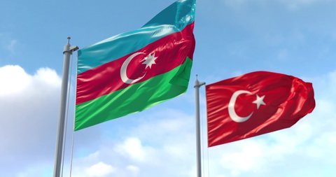 Azerbaijan and Turkey flag on flagpole. Azerbaijani and Turkish waving flag in wind. Сooperation, military exercises. Luma Track Mattes for background cutting.