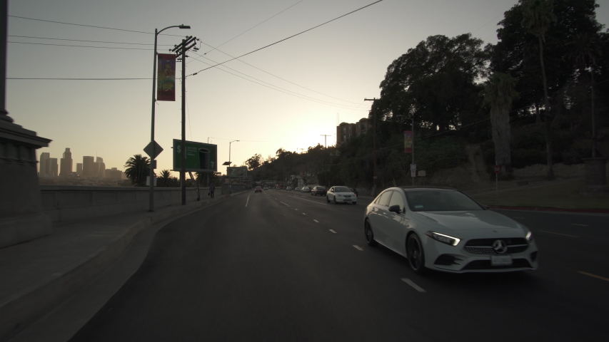 Los Angeles Downtown Broadway Bridge Northbound Sunset Driving Plate Rear View 2 Pasadena Ave Royalty-Free Stock Footage #1056671111