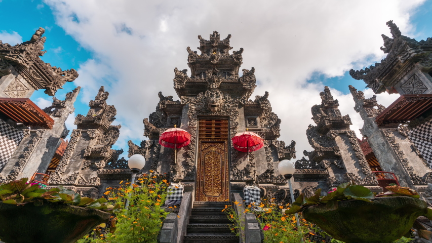 Gardian statue at entrance Bali temple / Bali Hindu temple / Bali, Indonesia Royalty-Free Stock Footage #1056692615
