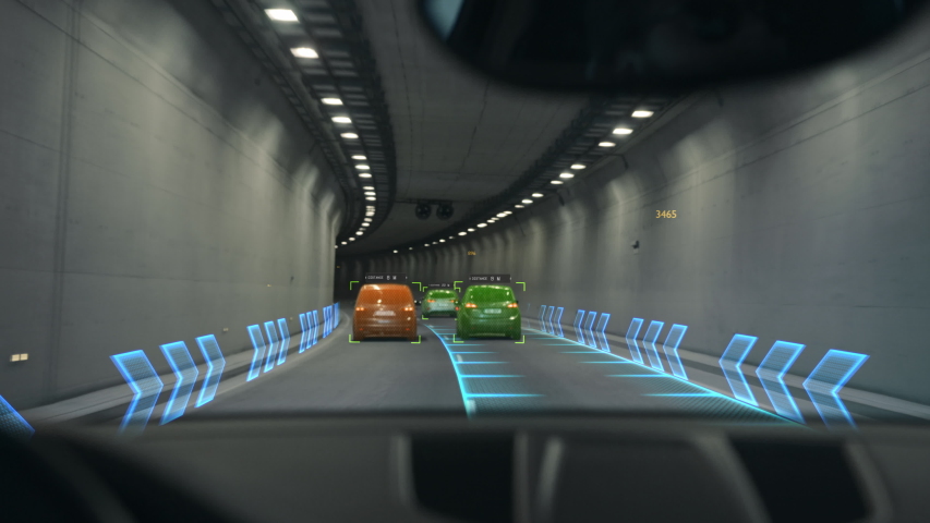 Futuristic Concept: Autonomous Self-Driving Car Moving Through Tunnel, Head-up Display HUD Showing Infographics: Speed, Distance, Navigation. Road Scanning. Driver Seat Point of View POV Royalty-Free Stock Footage #1056693611
