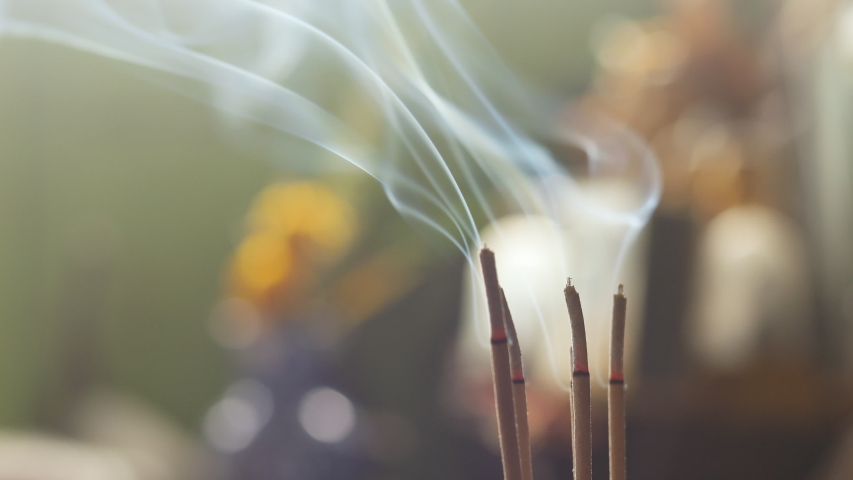 Close up of Asian Buddhist Incense Sticks Royalty-Free Stock Footage #1056702497