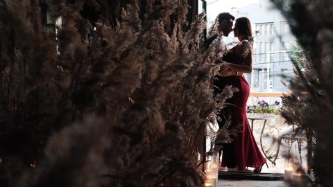 Gentle Intimacy Hugs, Passionate Desire of Young Affectionate Couple Enjoying Each Other, Together Standing on Restaurant Balcony. Sensual Girlfriend and Boyfriend Lovers on Romantic Evening Love Date