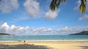 Phuket beach sea sand and sky. Landscape view of beach sea sand and sky in summer day. Beach space area. At Karon Beach, Phuket, Thailand. On 05 July 2020. 4K UHD. Video Clip