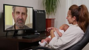 mother and baby having video chat using PC.