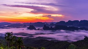  4k Timelapse Sunrise with fog at the viewpoint of Doi Ta Pang, Chumphon Province, Thailand.