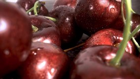 Close-up of cherries, macro shooting, the camera moves along the berries