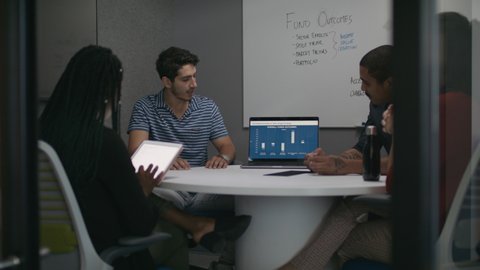 Getting the numbers. Team hears the data at a technology company. Working in a diverse workforce at the job of the future. Shot in slow-motion and in 4k. 