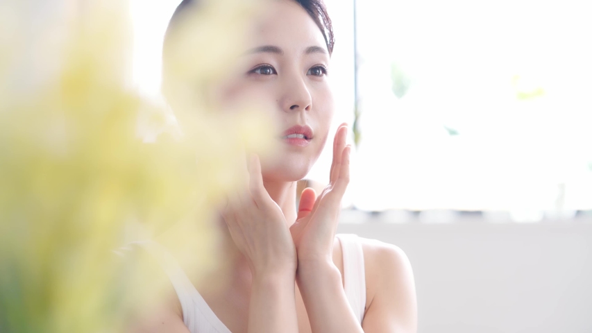 Beauty concept of an asian woman. Beauty salon. Skin care. Body care. Hair removal. | Shutterstock HD Video #1056763889