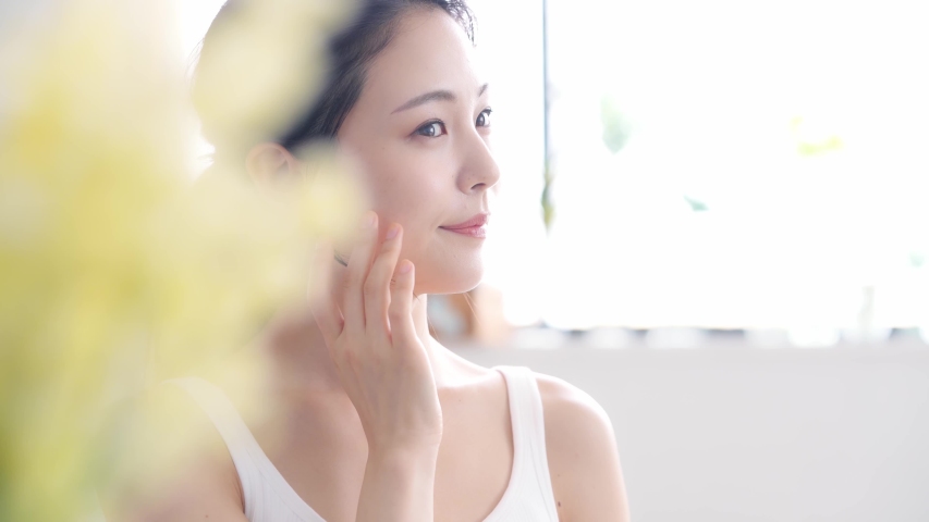 Beauty concept of an asian woman. Beauty salon. Skin care. Body care. Hair removal. | Shutterstock HD Video #1056763889