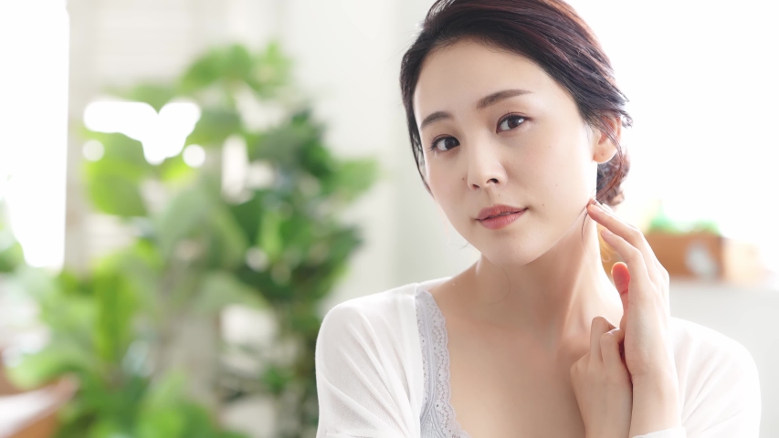 Beauty concept of an asian woman. Beauty salon. Skin care. Body care. Hair removal. | Shutterstock HD Video #1056763892