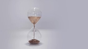 hourglass on the grey background