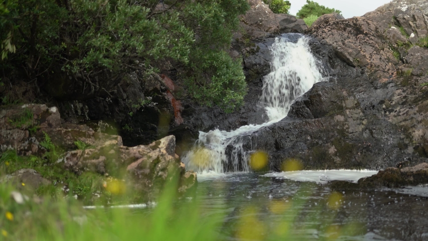 Static shot of a small waterfall off to the side of Aasleagh Falls on the outskirts of Leenane village on the Galway / Mayo border in the west of Ireland.
