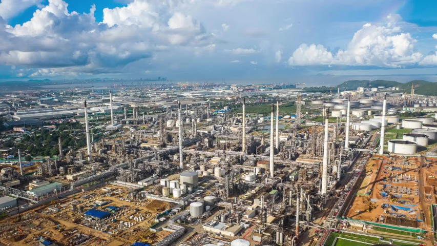 Aerial view hyperlapse 4k video of oil refinery terminal is industrial facility for storage of oil and petrochemical. oil manufacturing products. power electric plant. hyper lapse Royalty-Free Stock Footage #1056821279