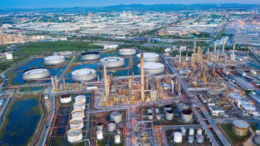 Aerial view hyperlapse 4k video of oil refinery terminal is industrial facility for storage of oil and petrochemical. oil manufacturing products. power electric plant. hyper lapse Royalty-Free Stock Footage #1056821282
