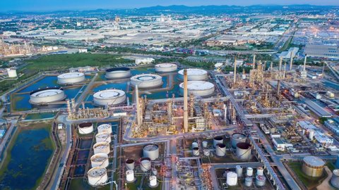 Aerial view hyperlapse 4k video of oil refinery terminal is industrial facility for storage of oil and petrochemical. oil manufacturing products. power electric plant. hyper lapse