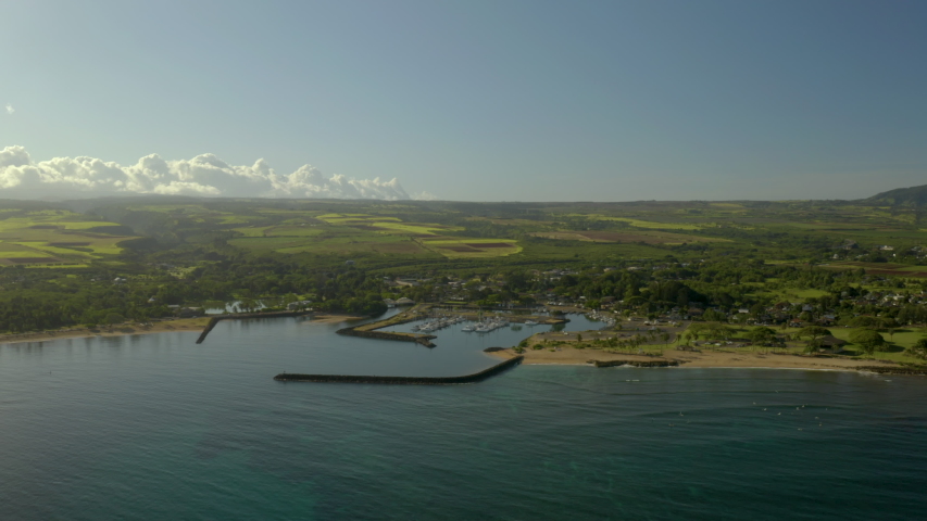 Aerial Establishing shot of Haleiwa Harbor on sunny morning