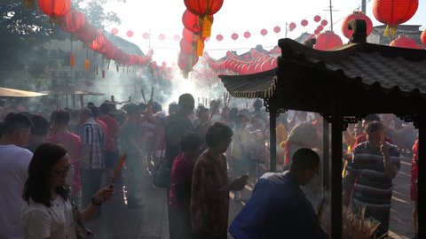 George Town, Penang / Malaysia - Jan 25 2020: Smoke release from joss stick burning.
