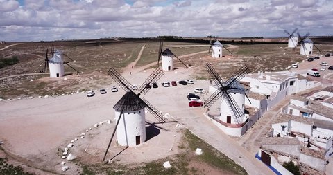 Picturesque rural landscape of Campo de Criptana with traditional windmills in sunny day, Spain