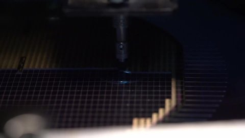 Pick up silicon die in silicon wafer in die attach machine in semiconductor manufacturing