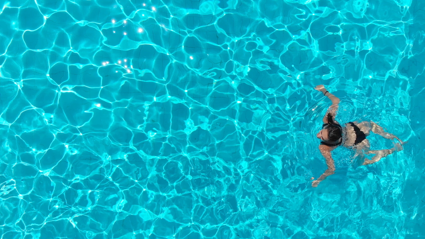 aerial view young woman swimming breaststroke Stock Footage Video (100% ...