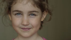 Portrait Little Girl Looking at Camera. Young Laughs Happily Child with Glasses Looking at Camera. Closeup. Inquisitive Little Kid Girl Portrait. Face Funny Contemplative Kid Child. - Powered by Shutterstock - Get 15% off with code: PIKWIZARD15