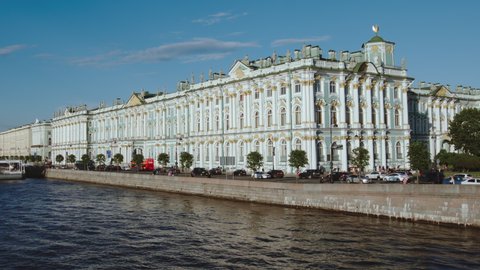 ST. PETERSBURG, RUSSIA - JULY 5, 2017: The State Hermitage, Neva river and car traffic in the summer