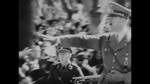 CIRCA 1938 - In this documentary directed by Frank Capra, the Munich Pact is signed by Hitler and Mussolini and is explained.