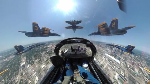 CIRCA 2020 - Aerial from the cockpit of a Navy Blue Angel flying in formation honoring COVID 19 responders.