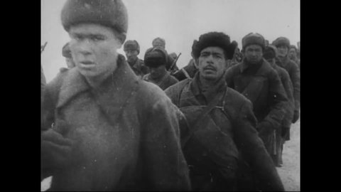 CIRCA 1942 - In this Frank Capra documentary, Russian Army reserves march through snowy landscapes to reach Stalingrad.