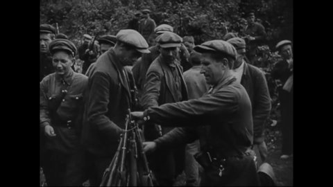 CIRCA 1941 - In this Frank Capra documentary, Russian guerrilla armies comprised of men and women are seen fighting in forests (narrated in 1943).