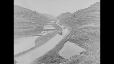 CIRCA 1938 - In this Frank Capra documentary, Chinese peasants fortify dikes in Zhengzhou to keep floodwaters of the Yellow River at bay.