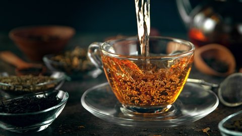 Super Slow Motion Shot of Pouring Tea at 1000 fps with Still Life Background.