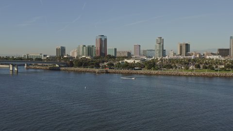 Long Beach CA Aerial v10 Approaching downtown cityscape with boat turning in foreground - October 2019