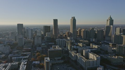 Atlanta Aerial Multi neighborhood cityscape flying from Downtown to Reynoldstown in reverse - December 2018