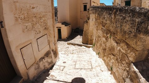 View of a narrow alley in the city of Matera, Italy