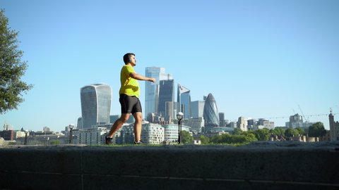 Slow motion shot of man during workout in city Video stock