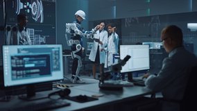 In Robotics Development Laboratory: Engineers and Scientists Work on a Bionics Exoskeleton Prototype with Person Testing it. Designing Wearable Exosuit to Help Disabled People, Warehouse Workers - Powered by Shutterstock - Get 15% off with code: PIKWIZARD15