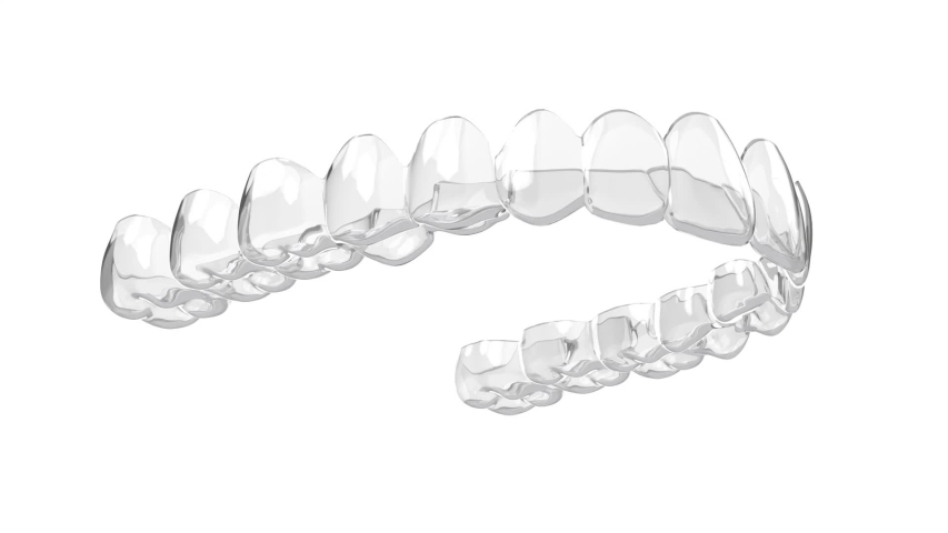 Invisalign removable and invisible retainer over white background Royalty-Free Stock Footage #1056919415