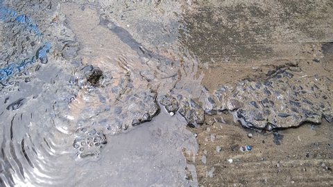 Water supply leaks under concrete roads
