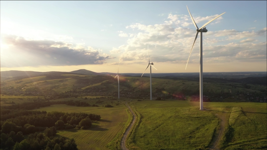 Alternative Energy. Wind farm. Aerial view of horizontal-axis wind turbines generating electricity Wind energy. Clean renewable energy technologies. Wind power plants. Animated visualization concept Royalty-Free Stock Footage #1056926783
