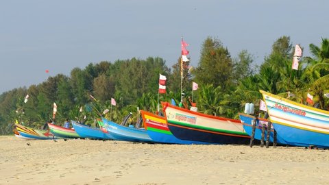 Kerala, India - November 28, 2019: Traditional fishing boats on the famous Marari beach in Kerala, India