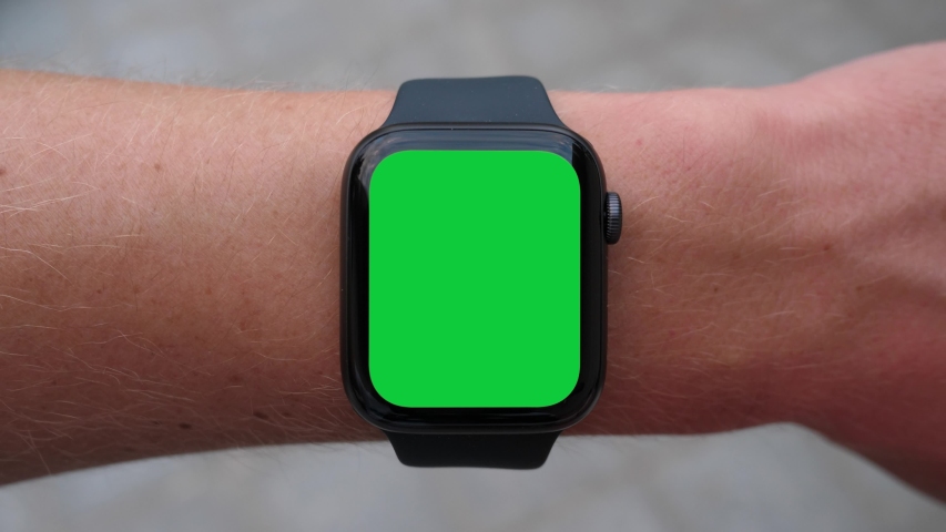 Single Tapping a Green Screen Smartwatch Royalty-Free Stock Footage #1056934769