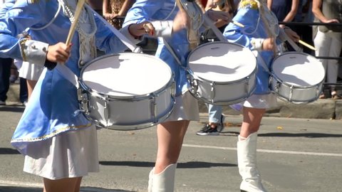 Ternopil, Ukraine July 31, 2020: Street performance of festive march of drummers girls in blue costumes on city street