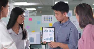 The creative team cooperating in office talking working together at workplace. They are discussing a new project together. Leadership, Successful, Teamwork and Business concept. - Powered by Shutterstock - Get 15% off with code: PIKWIZARD15