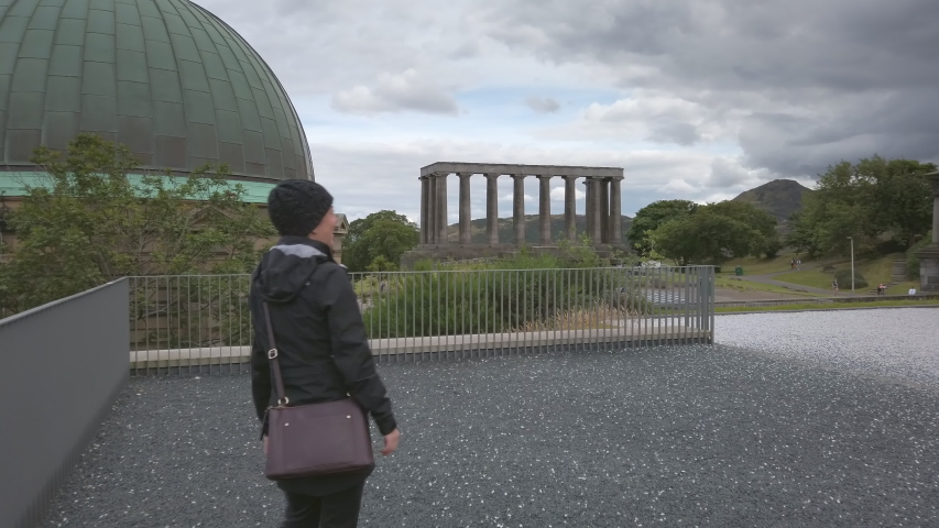 Exploring Calton Hill, Edinburgh, Scotland on cloudy day in summer